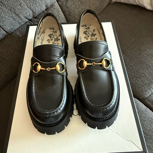 Gucci Black and Gold Horsebit Loafers